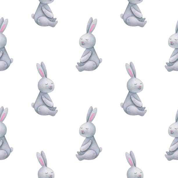 istock Seamless pattern for with a gray toy rabbit. Plush bunny toys for the baby. White background with watercolor ornament for baby and small child. Cute bunny print for baby fabric, paper, packaging, scrapbooking. 1362982972