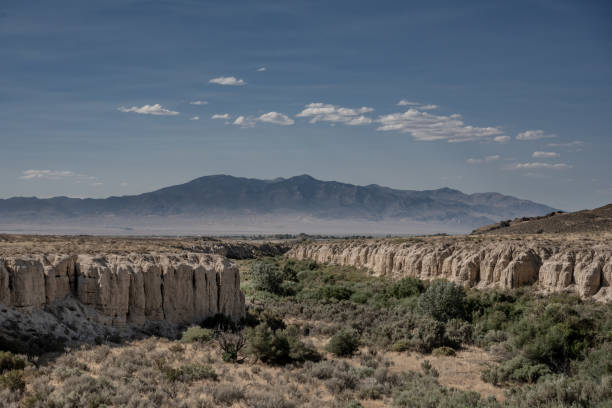 istock Small Bunch of Clouds Over Desert Wash 1362983912