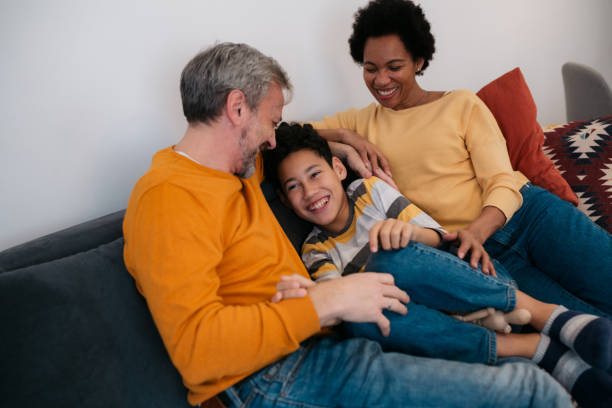 istock Happy diverse family bonding at home 1362985985