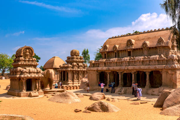 Mahabalipuram, India - Tourists At The One Thousand Three Hundred Year Old Pancha Rathas stock photo