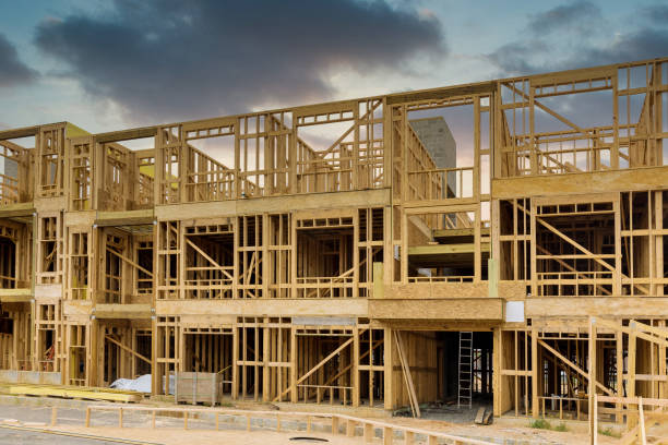 istock Fragment of a new home under construction wood framing beams 1362990476