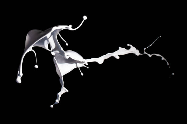 istock White paint splash isolated on black background. 1362991583