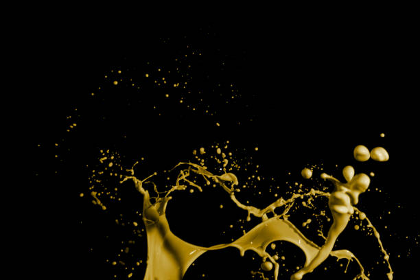 istock Yellow paint splashes, isolated on black background 1362992345