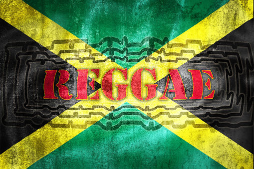 Reggae label illustration on grunge Jamaica flag, symbol of music genre