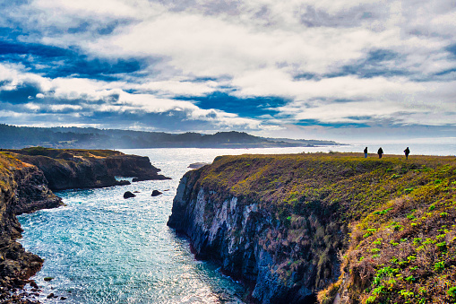 Mendocino, United States - February 16 2020: a majestic view of the bay cliffs and inlets of Mendocino and his rocks