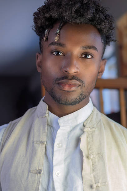 young man in his twenties african guy portrait confident handsome looking stock photo