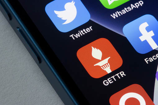 Portland, OR, USA - Jan 5, 2022: GETTR app icon is seen on an iPhone. Gettr is a right-wing social media platform and microblogging site founded by Jason Miller, a former Donald Trump aide.