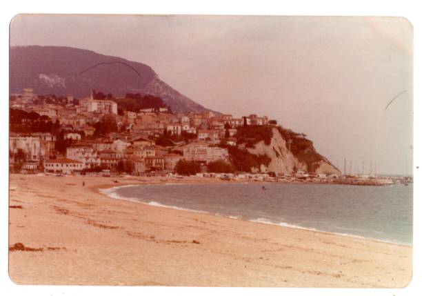 1970s VINTAGE PHOTO OF AMALFI BEACH IN ITALY 1970s VINTAGE PHOTO OF AMALFI BEACH IN ITALY taken with kodak kodachrome yt stock pictures, royalty-free photos & images