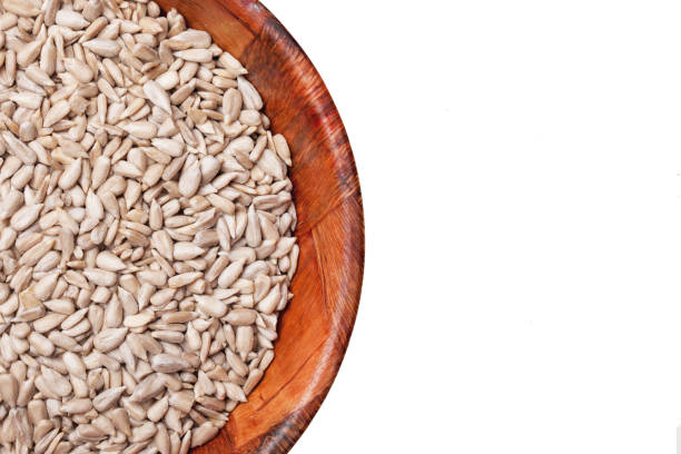 istock Hulled sunflower seeds in wooden bowl. 1363005880