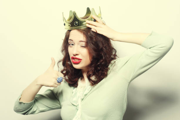 istock young lovely woman in crown 1363006972