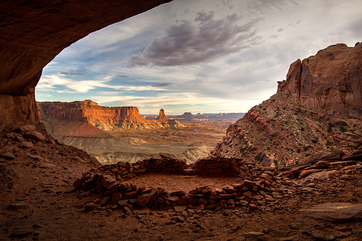 Evening light and clouds on the buttes behind False Kiva. Taken at Canyonlands National Park near Moab, Utah.