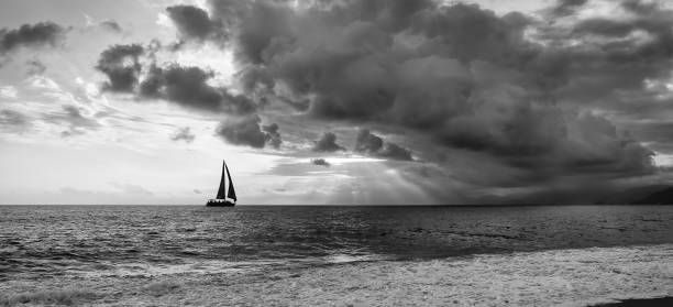 istock Sunset Sailboat Ocean Sun Ray Journey Black And White Banner Format 1363018527