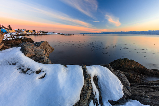 Winter wilderness in Idaho at sunrise along the banks of stream