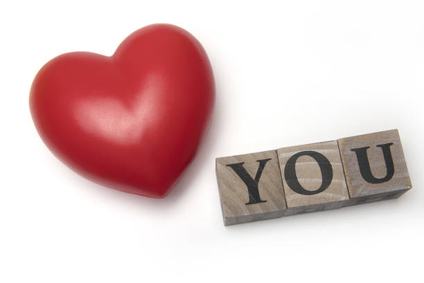 istock red heart wooden cubes love white background 1363023969