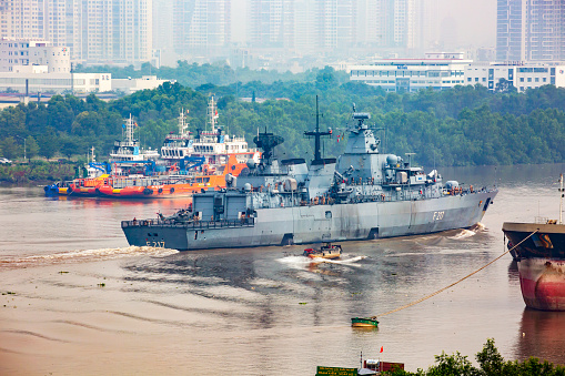 Ho Chi Minh city, Vietnam January 06th 2022: the German Navy's frigate Bayern docked at Saigon port for a 4-day friendship visit (January 6 to January 9).\nThe Bayern frigate is nearly 139m long and has a full load displacement of nearly 4,500 tons. The ship is equipped with 76mm gunboats, vertical launchers for anti-aircraft missiles and anti-ship missile launchers and torpedoes. On deck there is a Westland Super Lynx Mk.88A submarine hunting helicopter number 8326 with more than 230 crew members.