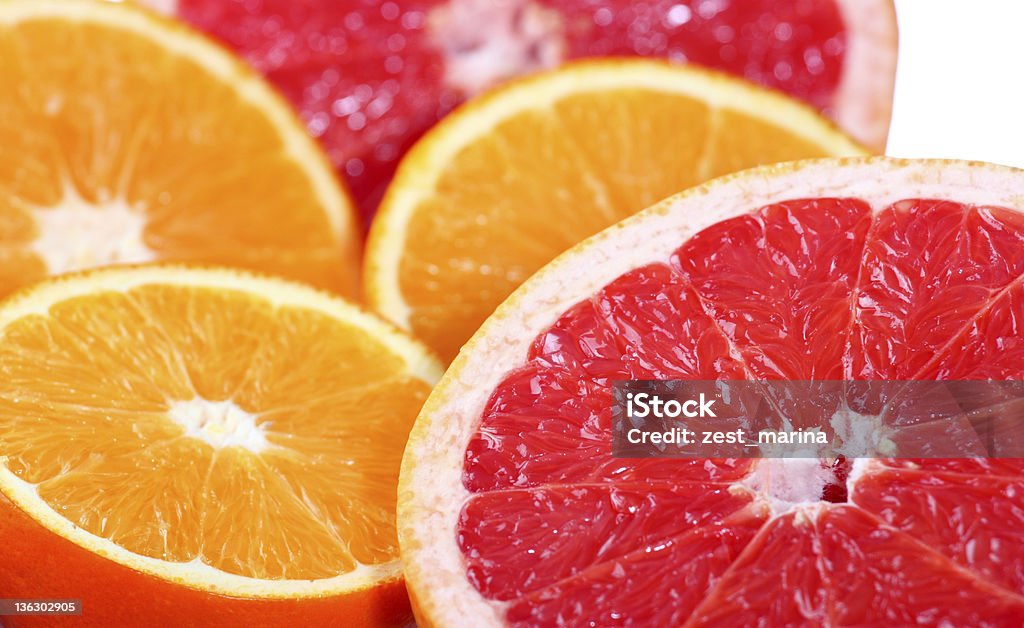 Citrus fruits: orange, grapefruit Close-up of a fresh orange, grapefruit Backgrounds Stock Photo