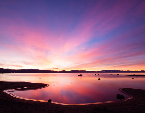 One of the most beautiful sunrises, a cascade of colors across the sky. North shore of Lake Tahoe, California