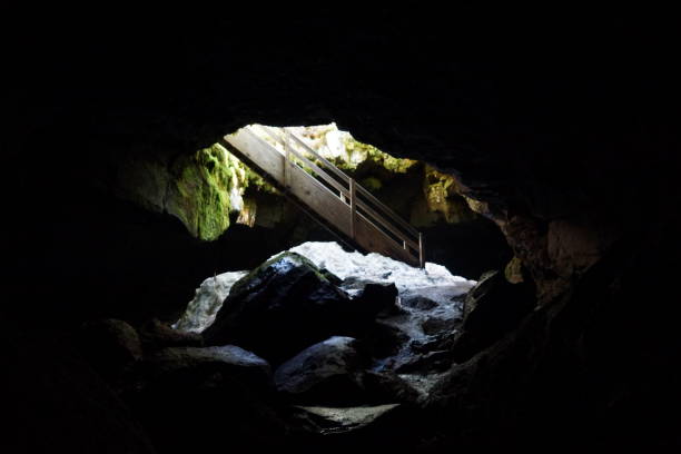 Stairs leading down to the entrance of an ice cave