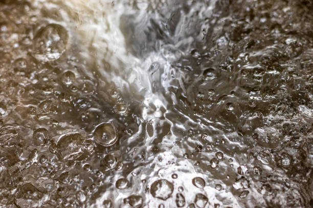 The surface of violently bubbling water