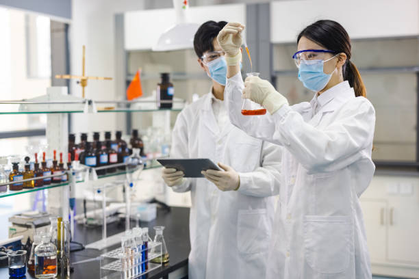 istock Scientists are working at chemical lab. 1363035167