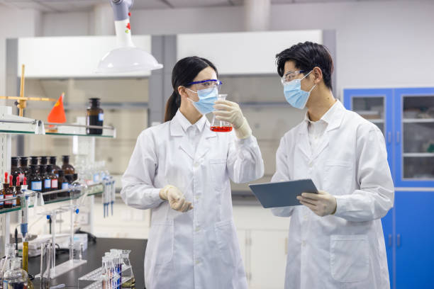 istock Scientists are working at chemical lab. 1363035169