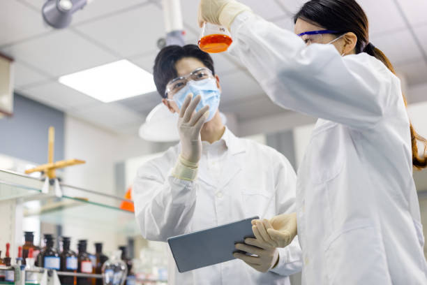 istock Scientists are working at chemical lab. 1363035174
