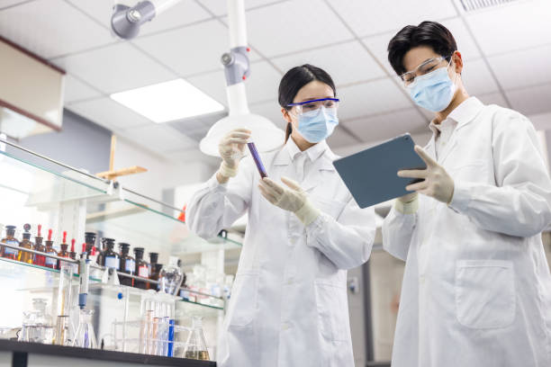 istock Scientists are working at chemical lab. 1363035178