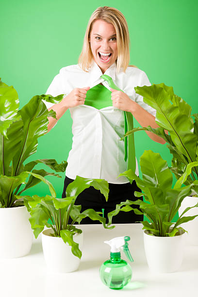 Green business superhero woman crazy plants Green business superhero woman crazy shouting plants environment friendly superhero environment women green color stock pictures, royalty-free photos & images