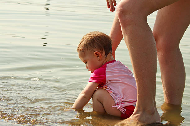 istock Baby Mom Play Beach 136304059