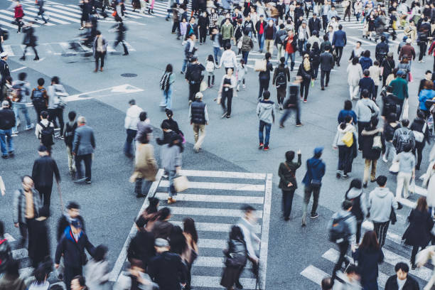 istock People walking crosswalk at Umeda in Osaka,Japan 1363044300