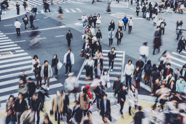 istock People walking crosswalk at Umeda in Osaka,Japan 1363044302