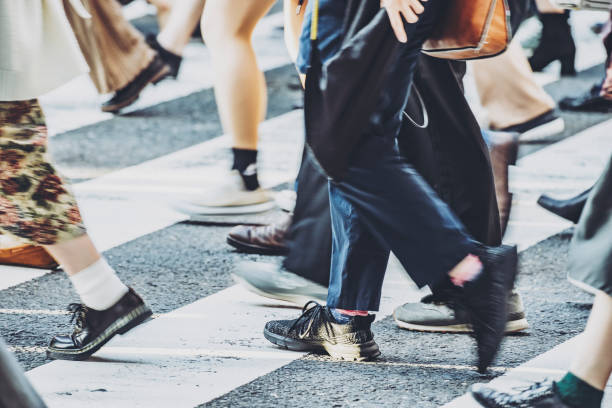 istock People walking crosswalk at Umeda in Japan 1363044365