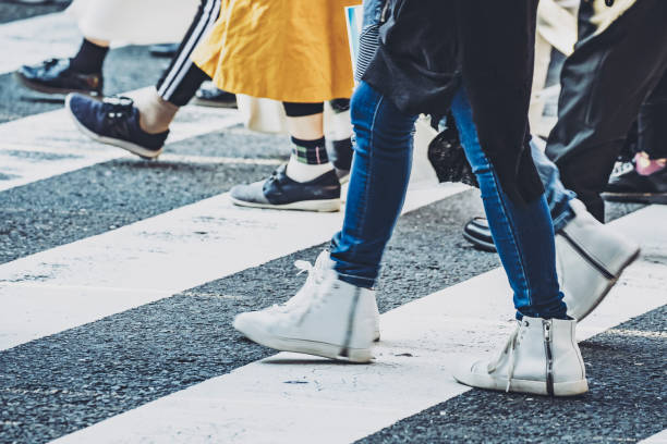 istock People walking crosswalk at Umeda in Japan 1363044379