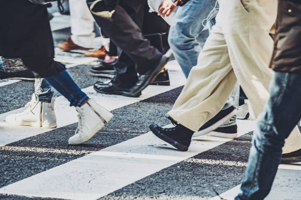istock People walking crosswalk at Umeda in Japan 1363044391