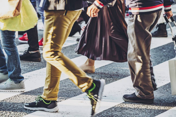 istock People walking crosswalk at Umeda in Japan 1363044393