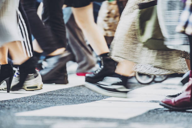 istock People walking crosswalk at Umeda in Japan 1363044399