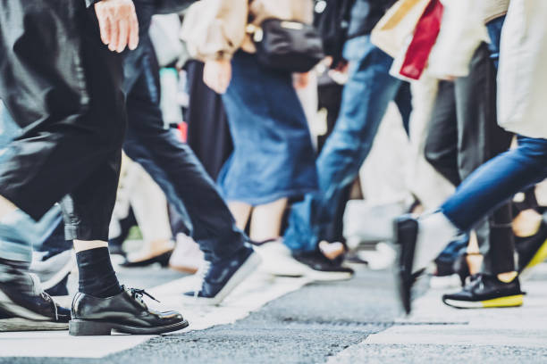 istock People walking crosswalk at Umeda in Japan 1363044418