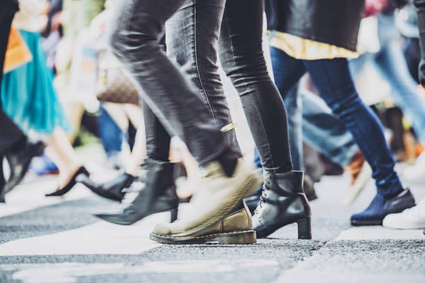 istock People walking crosswalk at Umeda in Japan 1363044445