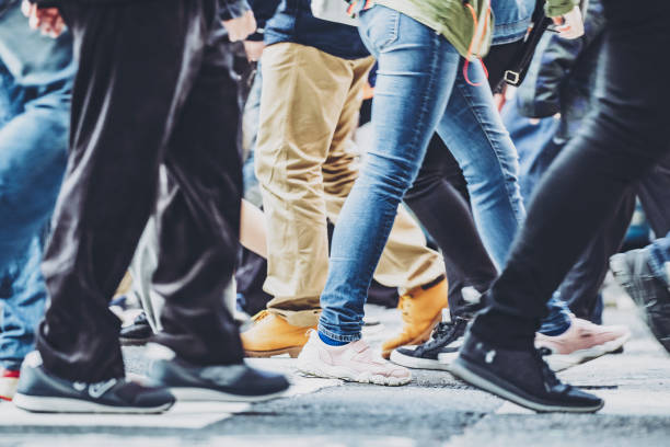 istock People walking crosswalk at Umeda in Japan 1363044451