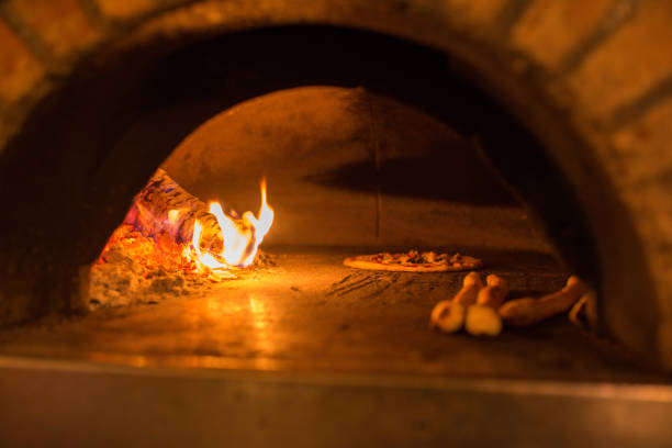 istock Fresh pizza in the wood oven 1363045032