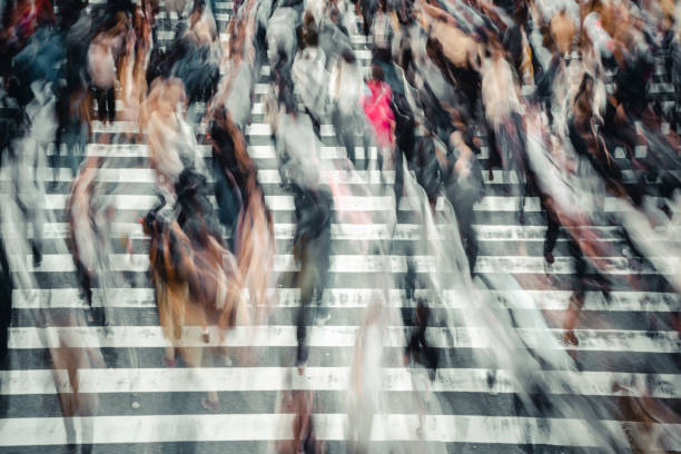 istock People walking crosswalk at Umeda in Osaka,Japan 1363045148