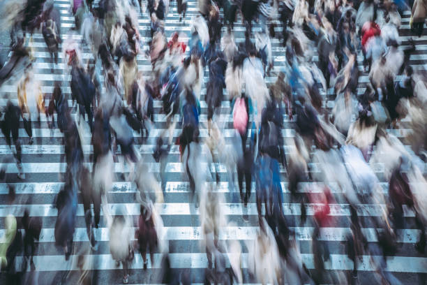 istock People walking crosswalk at Umeda in Osaka,Japan 1363045168