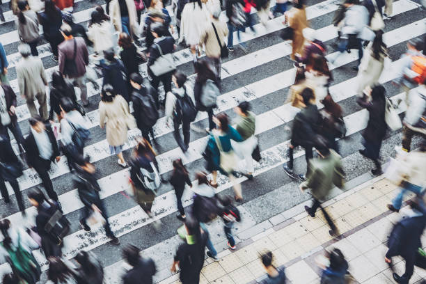 istock People walking crosswalk at Umeda in Osaka,Japan 1363045189