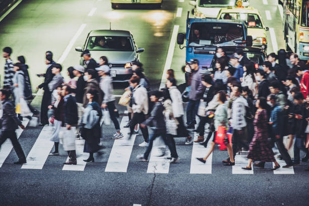 istock People walking crosswalk at Umeda in Osaka,Japan 1363045228