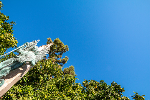 Angel Statue from unknown sculptor outside Palau de la Generalitat at Plaça de la Mare de Déu (also Plaza de la Virgen) in Valencia, Spain