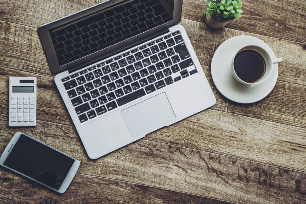 istock Desk work image of laptop and coffee 1363046529