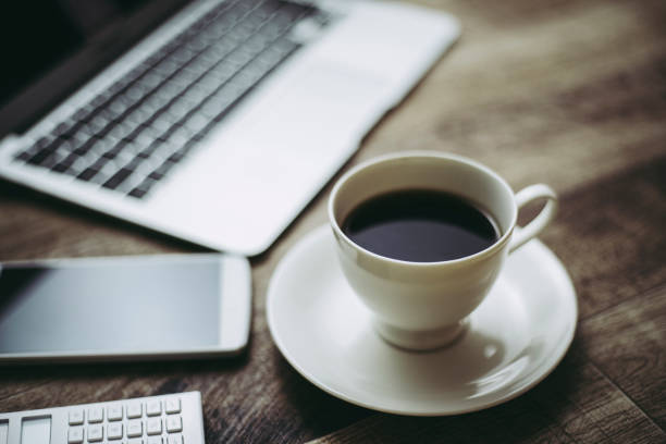 istock Desk work image of laptop and coffee 1363046578