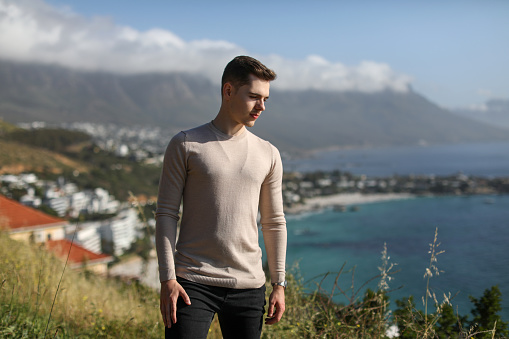 Portrait of a young caucasian male posing outdoors in Cape Town, South Africa.