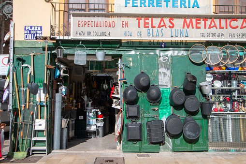 Hardware Store on Plaza del Doctor Collado in Valencia, Spain, with commercial signs and logos visible