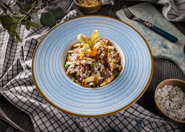 istock Fresh salad with prosciutto and pear 1363048083